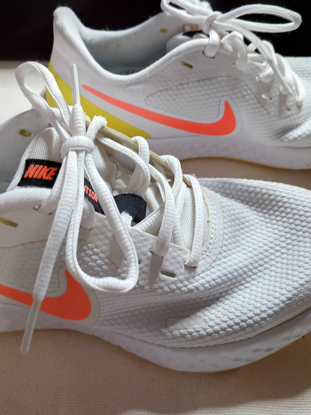 Nike Women’s White Running Shoes with Coral Swoosh